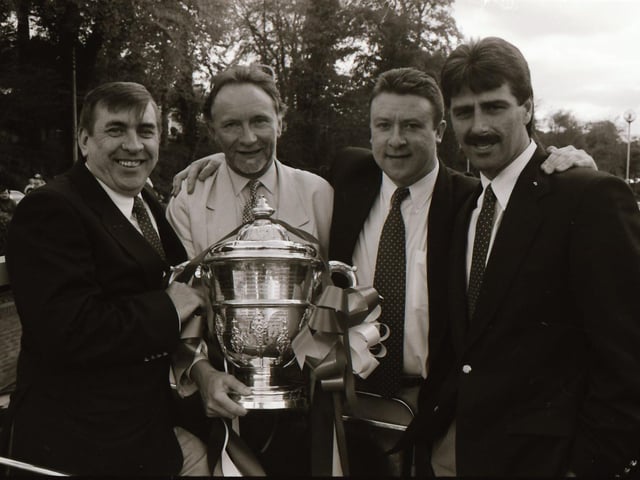 A delighted Philip Johnston, Phil Coulter, Philip O'Doherty and Felix Healy pose with the FAI Cup after Derry City's second ever success in the competition.