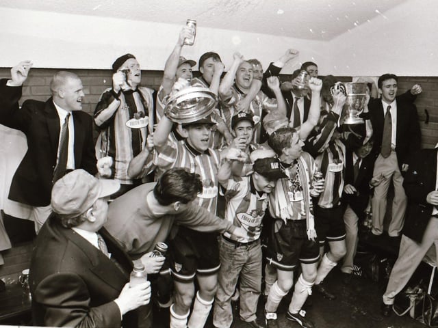 The celebrations are in full swing in the Derry City dressing room after defeating Shelbourne 2-1 in the final at Lansdowne Road.