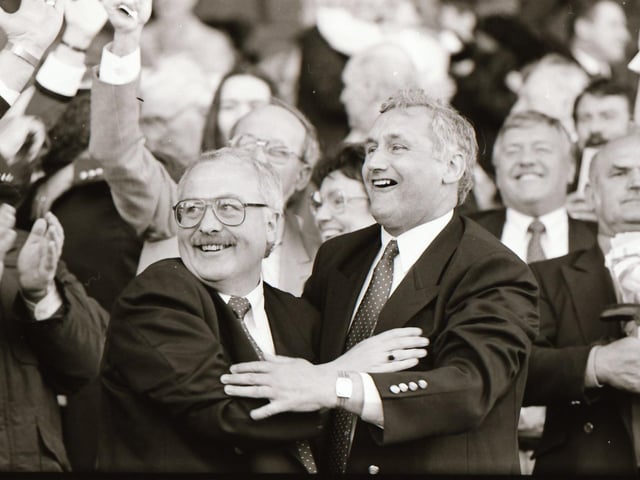 Jimmy McCartney and Dougie Wood celebrate Derry City's FAI Cup success after a 2-1 win over Shelbourne at Lansdowne Road.