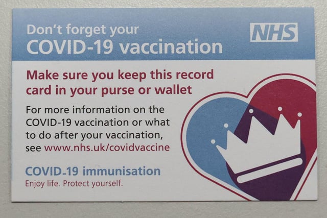 A Covid-19 Vaccination Record Card at the Royal Victoria Hospital, in Belfast, on the first day of the largest immunisation programme in the UK's history