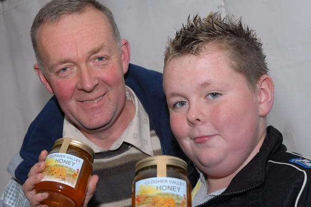 Father and son Trevor and Neill Watson, pictured at the Mid-Ulster Beekeepers stand at the Ballyronan Halloween Food Festival, held at Ballyronan Marina last Saturday.mm4407-190ar.