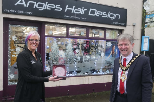 Angles Hair Design was the winner of the Best Christmas Window in Garvagh and the Mayor of Causeway Coast and Glens Borough Council Alderman Mark Fielding presented the award to Gillian Knight