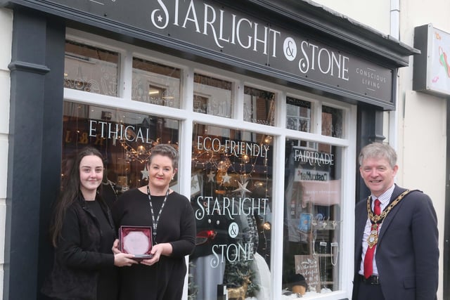 Starlight & Stone was the winner of the Best Christmas Window in Portrush and the Mayor of Causeway Coast and Glens Borough Council Alderman Mark Fielding presented the award to Ellen and Maryrose Stewart