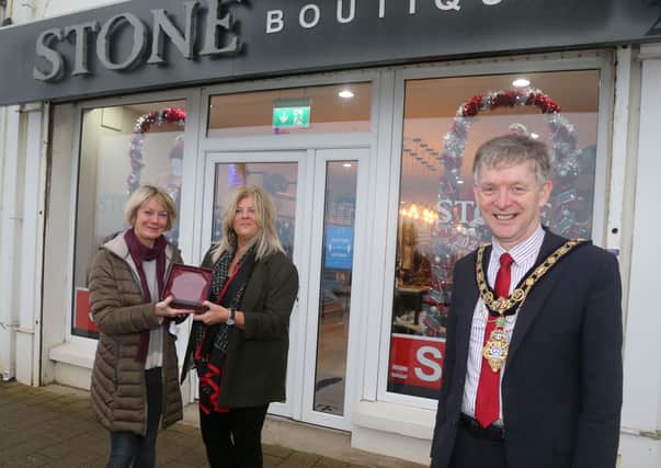 Stone Boutique was the winner of the Best Christmas Window in Portstewart and the Mayor of Causeway Coast and Glens Borough Council Alderman Mark Fielding presented the award to Lynda Hodge and Helen Beattie
