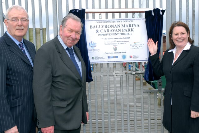 Michelle Gildernew, Minister for Agriculture and Rural Development, unveils the plaque to officially open Ballyronan Marina and Caravan Park, after extensive improvements. Included in the picture are Jim canning, chairman of Lough Neagh partnership and Michael McGuckin, chief executive with Cookstown Councilmm4107-108ar.