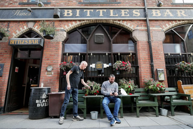 NI Sept 2020 - New COVID-19 restrictions for the hospitality sector to come in to place across Northern Ireland on Wednesday night at midnight.  Pubs, hotel bars and restaurants will have to shut at 23:00 as part of the new rules.  

Bittles Bar in Belfast City Centre. 

Picture by Jonathan Porter/PressEye