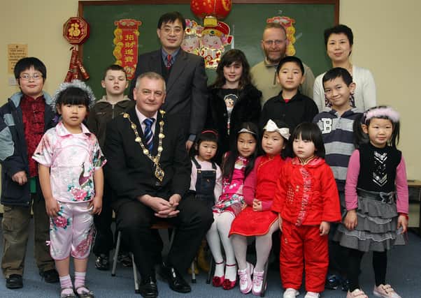 The Mayor of Londonderry Councillor Paul Fleming, with members and friends of the Londonderry Mandarin Speakers Association, who held a Chinese 2010 New Year celebration party, at the Chinese Language and Cultural School. Included are Xuesong Jin, association chairman, Caoimhe Lincoln, Mark Bradfield and Yang Zhou, event organiser. LS0610-509MT.