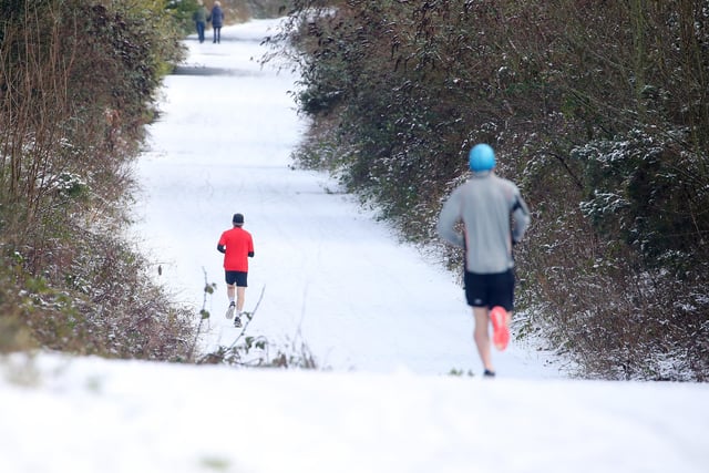 Runners on the greenway at Gilnahirk in east Belfast. 

Picture by Jonathan Porter/PressEye