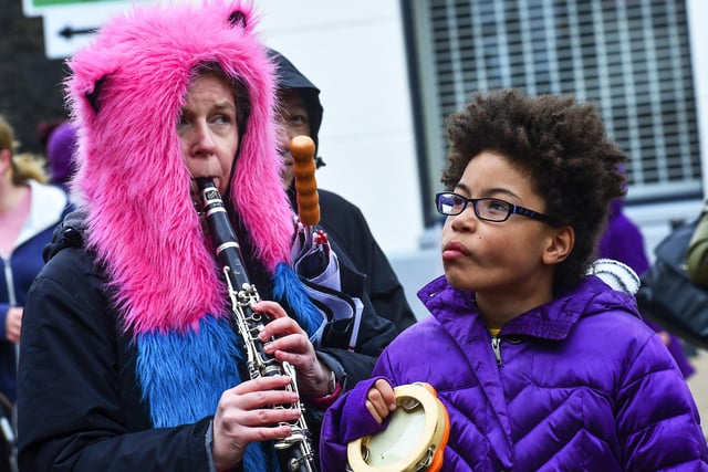 A woman plays a clarinet and young girl playing a tambourine at the 2015 City of Derry Jazz Festival. Photo: George Sweeney / Derry Journal.