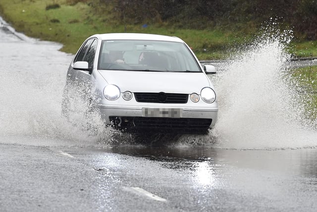 PACEMAKER BELFAST 03/02/2021 
Motorists Struggle threw the floods on the Moira Road on Wednesday as heavy rain falls across parts of N Ireland.
Pic Pacemaker