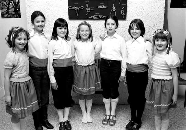 1980... St Eugene's Brigini and Guides, winners of the Primary European Folk Dance at Feis Doire Colmcille. From left are Oonagh Black, Nuala Canning, Deirdre Doherty, Joan Coyle, Catherine McGowan, Toni Harkin and Carron McKinney.