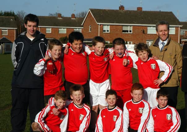 The Donacloney Primary School team with Mr Ryan Orr, teacher and Keith Hamilton in 2008