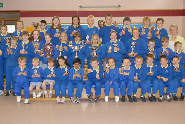 Bleary Primary School pupils with the awards they received at the end of term prize day in 2008. Also included is Mrs Joy Wilson
