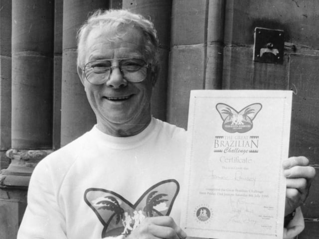 Frankie Ramsay with the certificate he received after completing the Great Brazilian Challenge, a walk for charity through the rain forests.