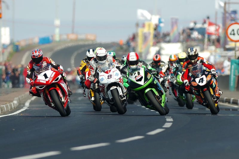 Michael Rutter (3), eventual winner Steve Plater (1), Guy Martin (8) and John McGuinness (4) at the start of the feature NW200 Superbike race.