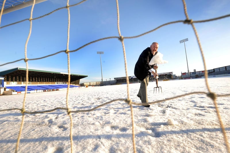Ivan Kyle on the snow covered Showgrounds pitch which led to the derby match against Ballymena United to be called off