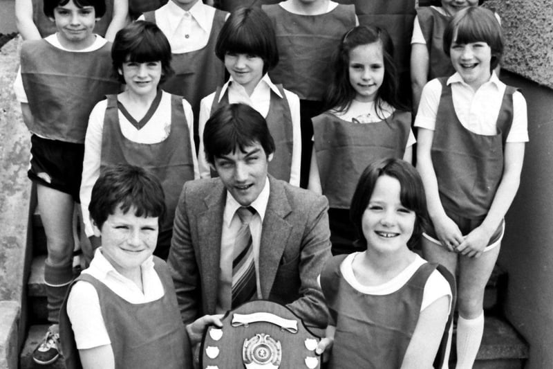 June 1981... Kids from Dungiven Road PS who were successful at the Waterside school's athletics day. Included, alongside coach Willie Clifford, are Rachel McCarron, Barbara Friel, Fiona McMenamin, Andrena McMurray, Rosemary Leonard, Frances McGowan, Oonagh Doherty, Pauline Nicell, Sinead McGahey, Kieran Harkin, Stephen Elliott, Stephen Doherty, Gary Russell, Gerry McLaughlin, Vincent Friel and Niall Patton.