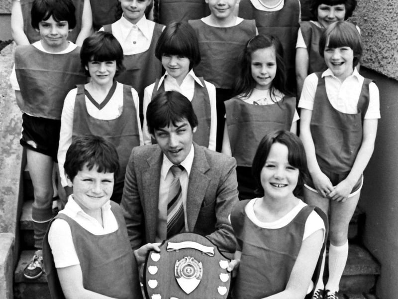 June 1981... Kids from Dungiven Road PS who were successful at the Waterside school's athletics day. Included, alongside coach Willie Clifford, are Rachel McCarron, Barbara Friel, Fiona McMenamin, Andrena McMurray, Rosemary Leonard, Frances McGowan, Oonagh Doherty, Pauline Nicell, Sinead McGahey, Kieran Harkin, Stephen Elliott, Stephen Doherty, Gary Russell, Gerry McLaughlin, Vincent Friel and Niall Patton.