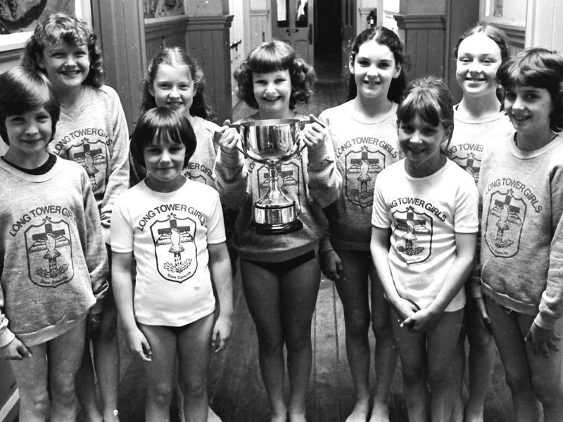 June 1981... St Columba's Girls PS, Long Tower, winners of the NW Schools' Swimming Association (primary schools section) at the annual gala. From left are Gina Doherty, Edel Rankin, Martina Casey, Brenda Moore, Stephanie Wood, Marie Matthewson, Sandra Doherty, Joanne McConnell and Carmel McConnellogue.