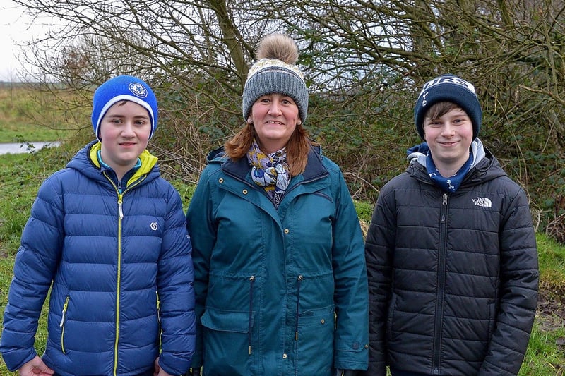 Jason Gallagher, Rhona Gallagher and Marcus Bond pictured walking in the Bay Road Park recently. DER2105GS – 029