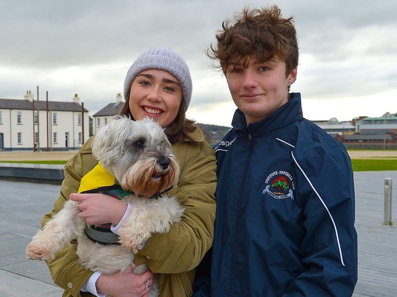 Sally Comey, Stephen Walker and Daisy pictured during a walk in Ebrington Square recently. DER2106GS – 013