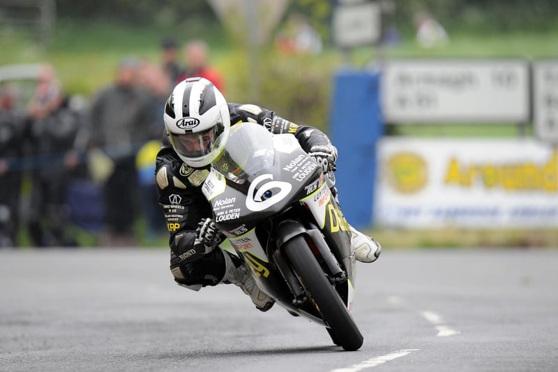 William Dunlop on his way to victory in the 125cc race. The Ballymoney man also won the 250cc race on his brother Michael's Honda for a double.