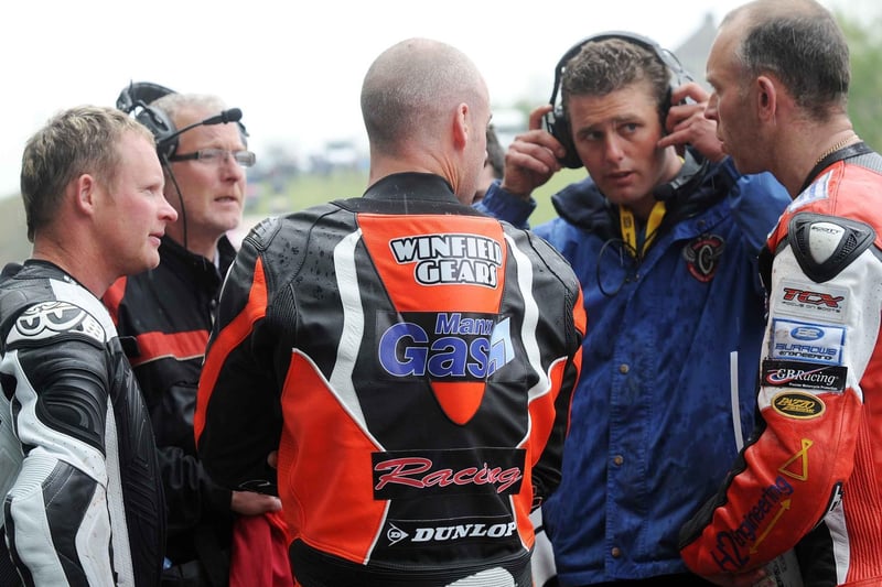 The Tandragee 100 feature race was cancelled in 2011 due to wet weather and concerns over a particular lack of adhesion on certain parts of the 5.3-mile course. Here, (from left) Adrian Archibald, Ryan Farquhar and John Burrows discuss the issue with Clerk of the Course RJ Woolsey.