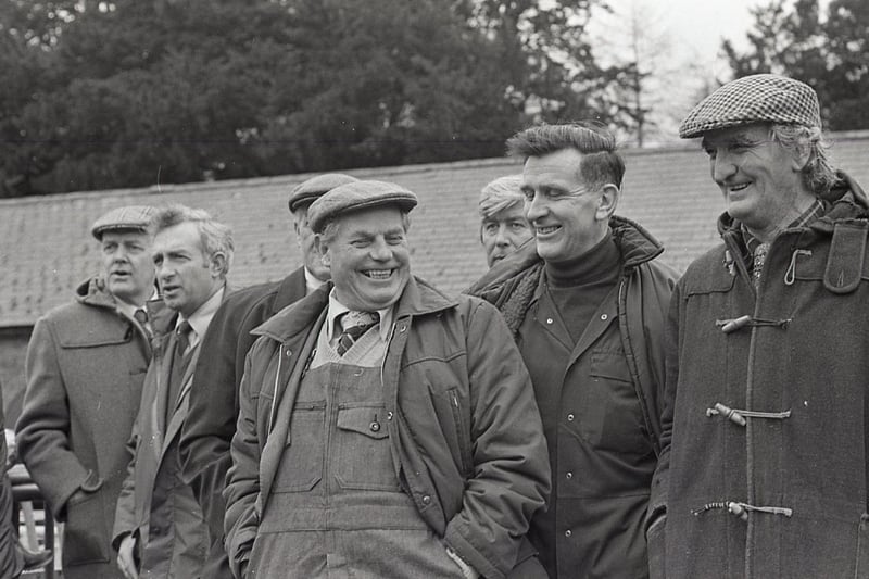 Sharing a joke at the dispersal sale of the Dickson Farms herd at Castle Ward in February 1982. Picture: Trevor Dickson/Farming Life archives