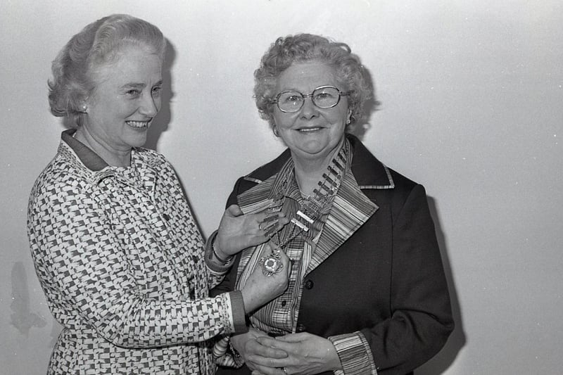 Dr Nan McKee, the new president of the Belfast Business and Professional Women's Club being installed by the outgoing president Miss Marion Donaldson in February 1982. Picture: News Letter archives