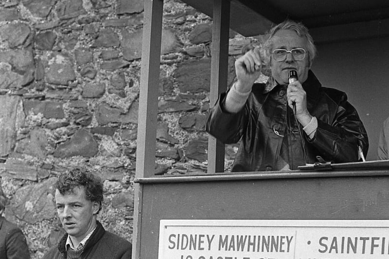Auctioneer Mr Sydney Mawhinney in action at the sale of the big suckler herd of Dickson Farms. To the left is Brian Dickson. Picture: Trevor Dickson/Farming Life archives