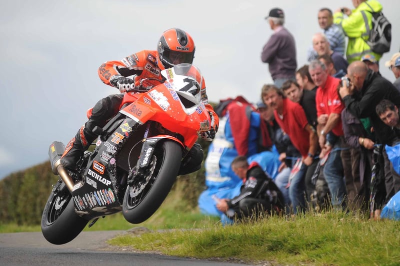 Ryan Farquhar on his way to victory in the Supersport race, which he won by 5.5 seconds from William Dunlop, with Michael Dunlop completing the top three, a further five seconds back.