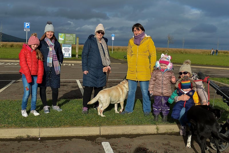 Sheila McCallion, third from left, pictured with her family bubble during a visit to Culmore Country Park recently. DER2107GS – 005