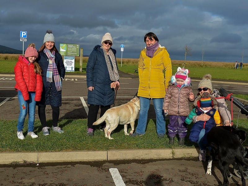 Sheila McCallion, third from left, pictured with her family bubble during a visit to Culmore Country Park recently. DER2107GS – 005