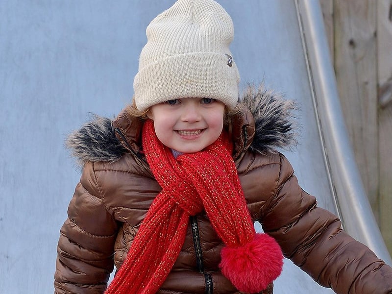 Four-year-old Hannah McCafferty enjoys a slide on a recent visit to Brooke Park.  DER2106GS – 026