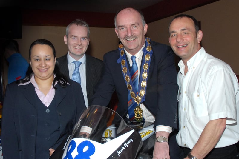 Cookstown Council vice-chairman Trevor Wilson astride one of the bikes on display at the launch of the 2007 Cookstown 100, which took place in the Royal Hotel, on Tuesday evening of this week. Looking on are Naegin Elliott, from Cookstown Tourist Information Centre, Terry Scullion, Cookstown Town Strategy manager, sponsors of one of the Races and Jackie McComb, chairman of Cookstown Motorcycle Club.mm1607-175ar.