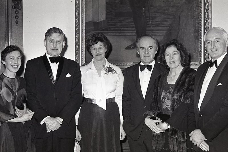 Above, pictured at the St Valentine's Day Ball held by A Division (Musgrave Street) of the RUC in the City Hall, Belfast, in February 1982, are Chief Superintendent George Martin, second from left, Divisional Commander, his wife Nan, Superintendent Cathal Ramsey, third from right, Sub Divisional Commander with his wife Moira and Superintendent David Turkington and his wife Eileen. Below, Superintendent Ossie Dixon and his wife Ellen with Chief Inspector Tom Quinn and his wife Catherine. Pictures: News Letter archives