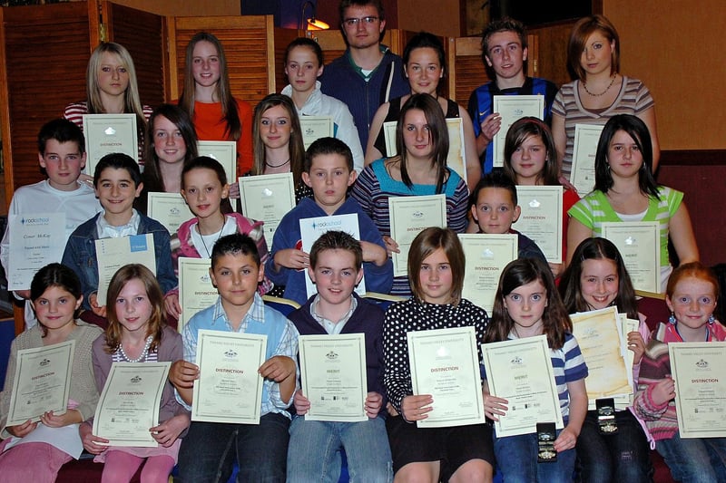 Students of the Mid-Ulster School of Music who gained their Spring and Summer certificates at a special presentation held in Gardiners Restaurant last Thursday night.mm43-312sr