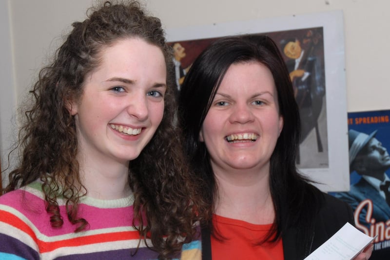 Fiona Donaghy, director of the Mid-Ulster School of Music pictured with student Michelle McCrystal, as they view her certificate awarded on obtaining her Grade 8 Musical Theatre Singing examination.mm2007-117ar.