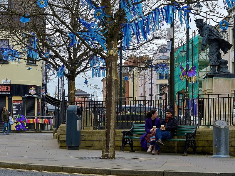 Colourful streamers decorate the Diamond to celebrate St Patrick’s Day. DER2110GS – 008