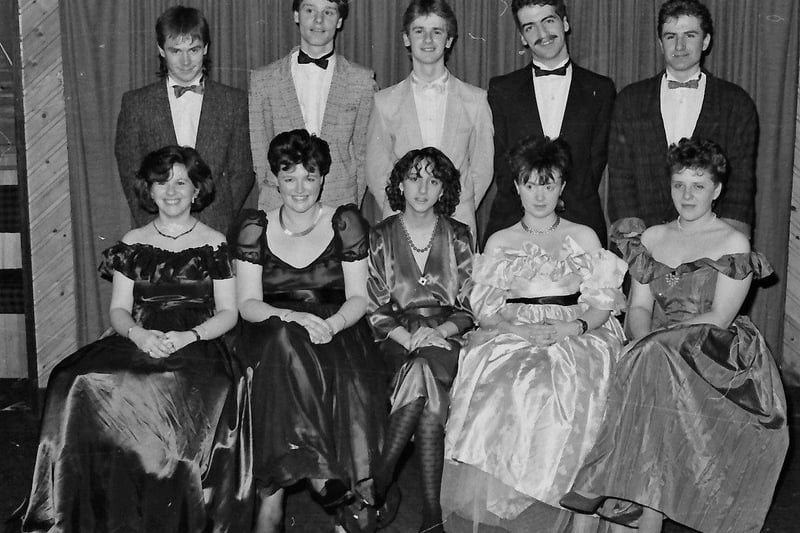 Seated, from left, are Terri Harkin, Claire Coyle, Jane Gillespie, Lisa Irwin and Geraldine Burns. Standing are Gary McCauley, Nicholas Macari, Martin Kivlehan, Kevin Doherty and Pearse Roddy.