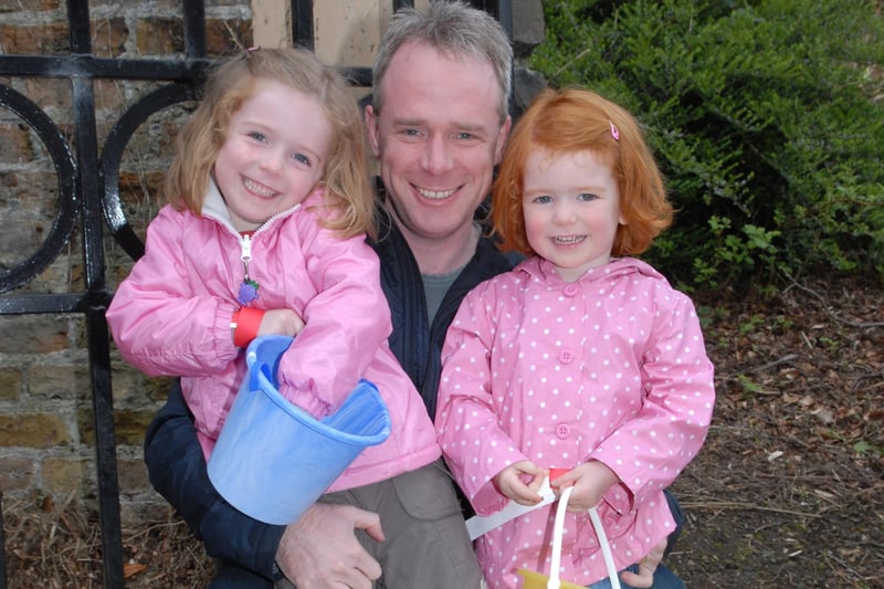 Ready to fill their buckets with Easter eggs are Sarah and Amy Preston with dad Mark at Carnfunnock in April 2007. LT15-321-PR