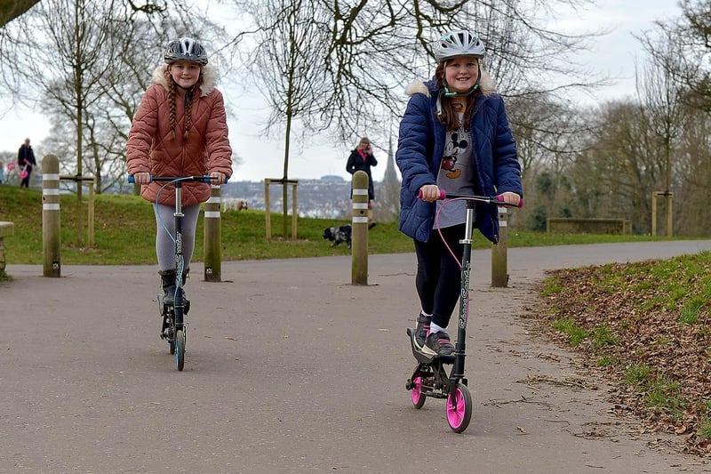 Elora Thompson, aged 9, and her sister Aerith (10) exercise on their scooters during a recent visit to St Columb’s Park. DER2109GS – 018