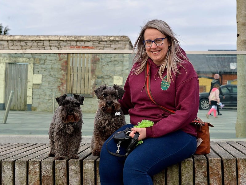 Caroline Kelly pictured with her two Schnauzer Terriers Molly and Poppy in Ebrington Square recently. Photos: George Sweeney. DER2110GS – 010