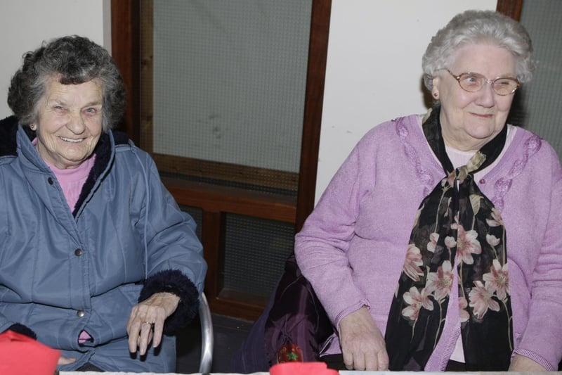DINNER FOR TWO. Margaret McLean and Florence Magee, who attended the Bushmills Senior Citizen's Christmas dinner on Wednesday at Mill Rest.BM51-020SC.