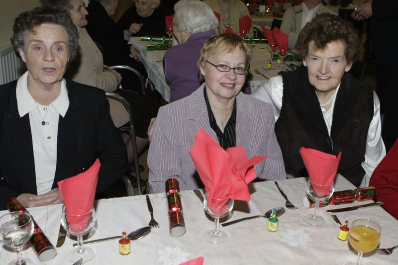 SMILES BETTER. Mary McClarty, Anne McIlroy, Mary Shields and Elizabeth Adair, who were all smiles for our cameraman at the Bushmills Senior Citizen's Christmas dinner at the Mill Rest Hostel on Wednesday.BM51-019SC.