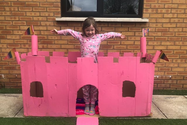 Evie Graham in the castle she built with her dad and brother
