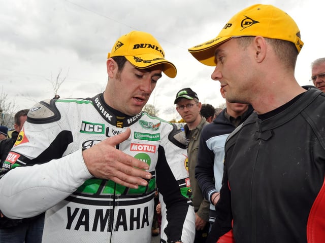 Martin Finnegan (left) and Keith Amot in conversation at the Cookstown 100 in 2008.