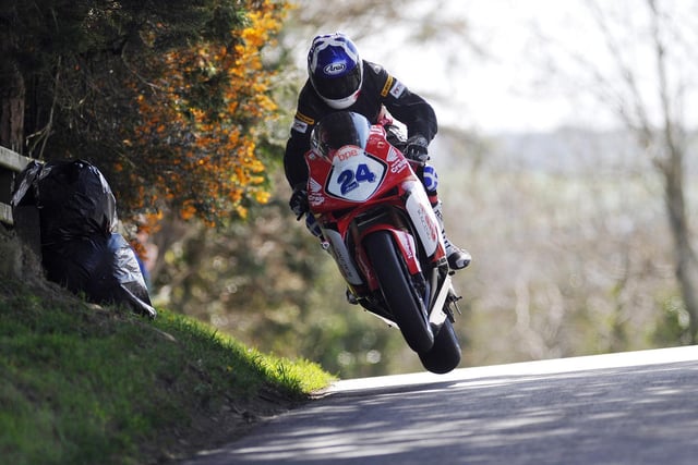 Hard-riding Scot Keith Amor set a new lap record as he won the Supersport race on the Wilson Craig Racing Honda.