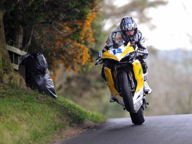 Adrian Archibald in action on the AMA Racing Suzuki at the Cookstown 100 in 2008.