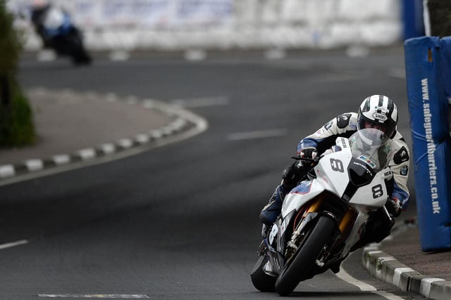 Stung by defeat after losing out again his brother William in the opening Superbike race, Michael Dunlop later made amends with victory for BMW in the headline race of the day. The win completed a double for Dunlop, who also triumphed in the Superstock event.